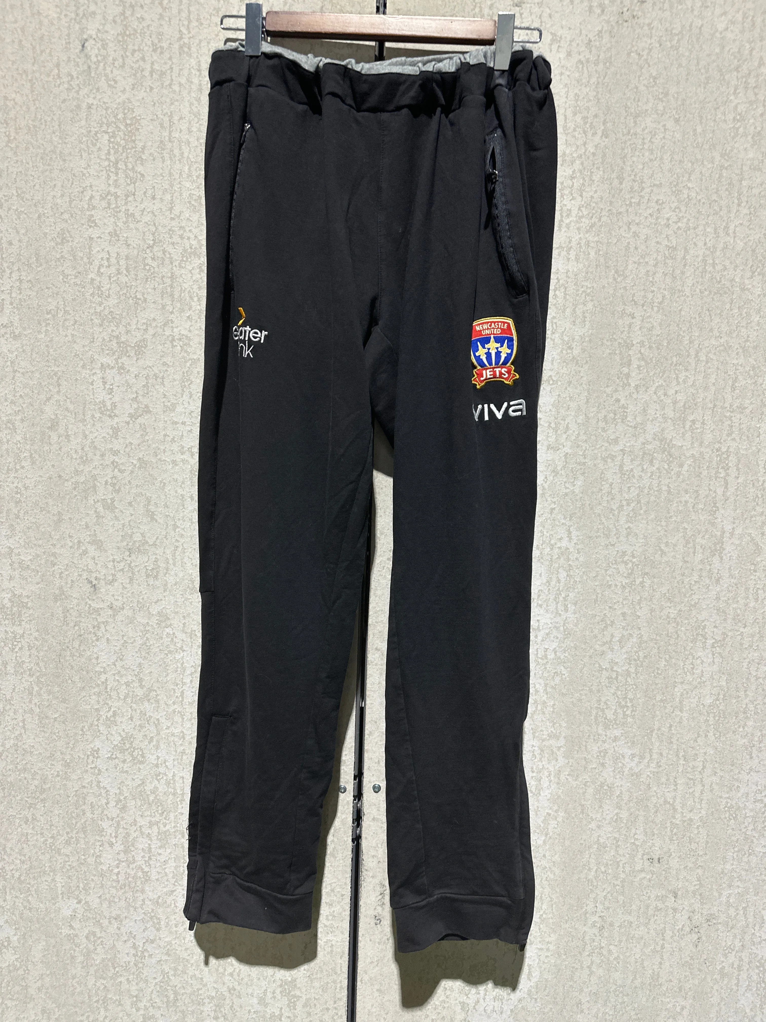 PRE LOVED NEWCASTLE JETS VIVA TRACK PANTS