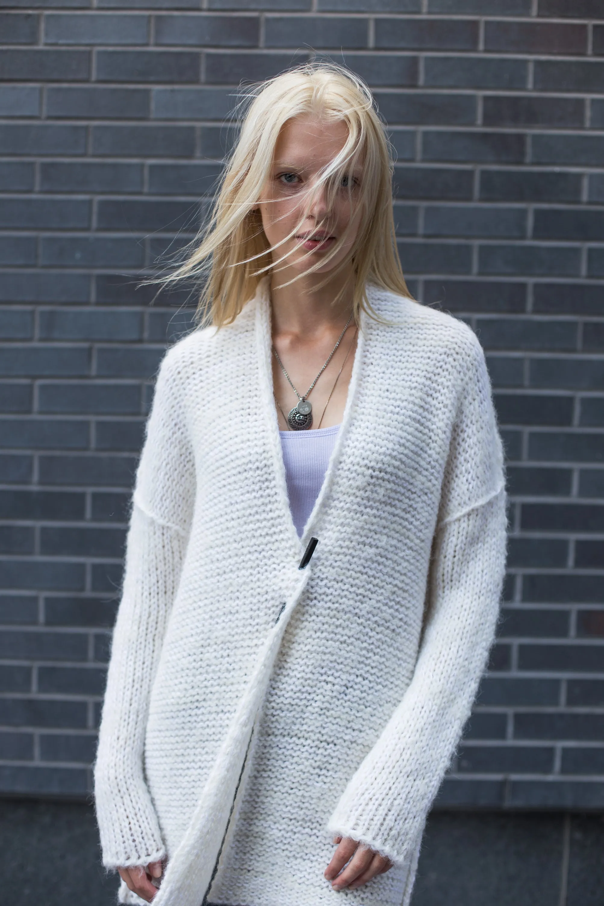 White alpaca knit cardigan.