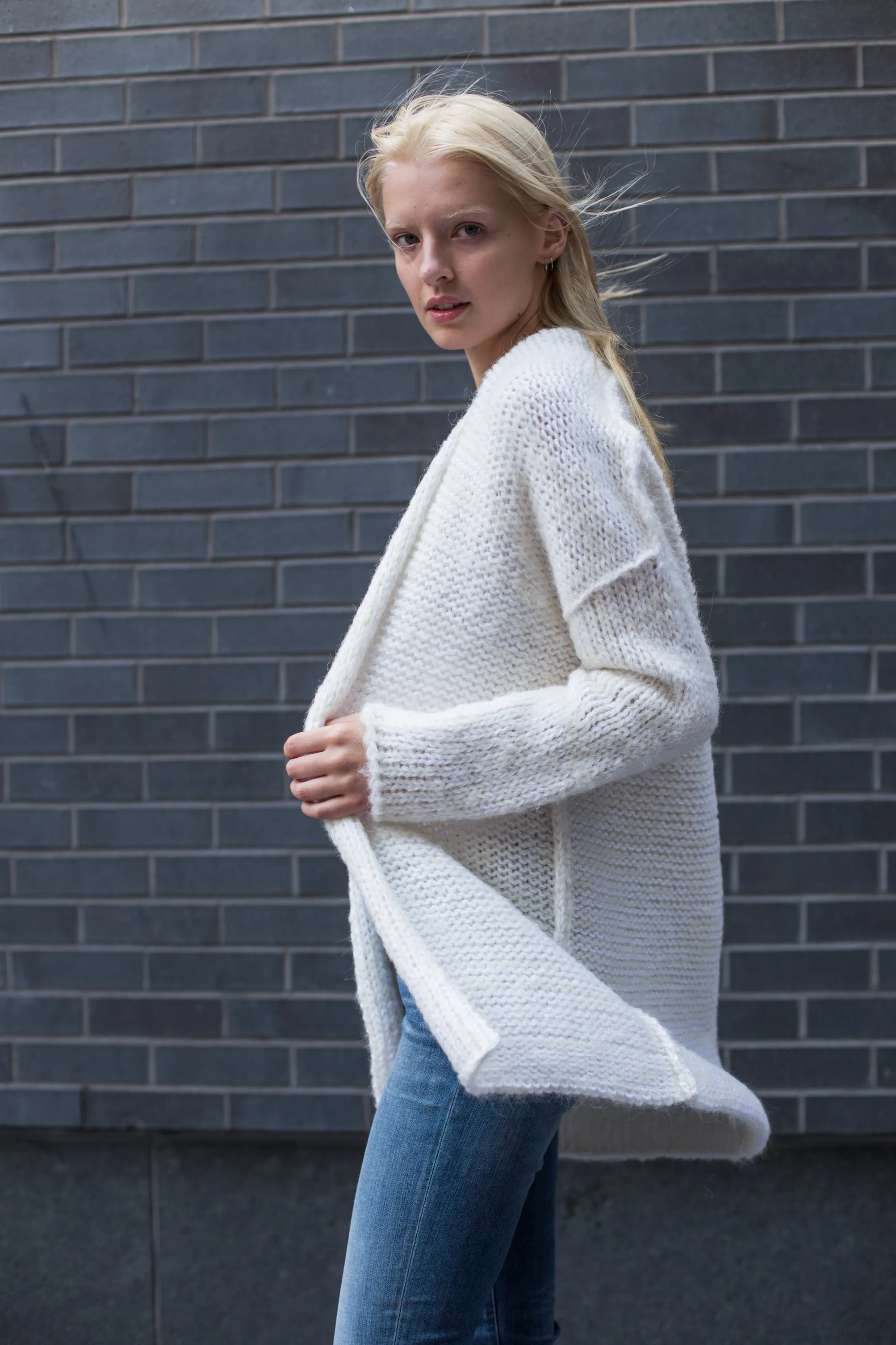 White alpaca knit cardigan.